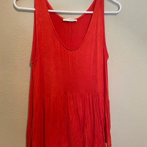 Red/Orange tank top with ruffle detailing. Size L